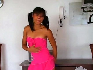 Cute Carla does a striptease